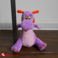 Jouet en peluche de dinosaure en peluche